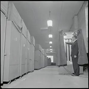 Hackensack Prints: Election Official Checking Voting Machinery Inside Booth