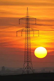 Electric power transmission lines, electricity pylon, with the setting sun, Beinstein near Stuttgart, Baden-Wuerttemberg, Germany, Europe Evening Atmosphere Collection: Electric power transmission lines, electricity pylon, with the setting sun, Beinstein near Stuttgart