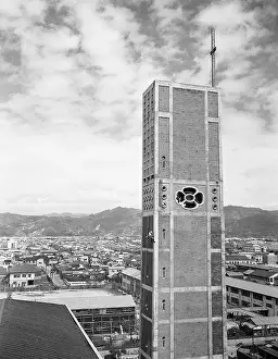 Hiroshima Prints: Electrician Working on Side of Bell Tower