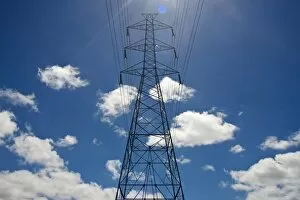 Images Dated 10th November 2012: Electricity pylon against a blue sky with clouds