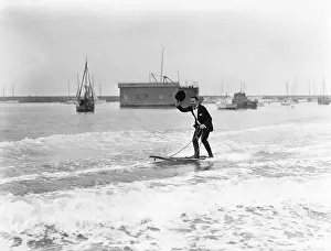 Sophistication Prints: Elegant man waterskiing