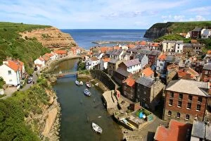 Harbor Gallery: An elevated view of the fishing village of Staithes, North Yorkshire, England