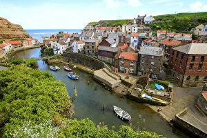 An elevated view of the fishing village of Staithes, North Yorkshire, England