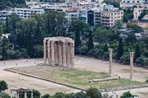 Prints of The Temple of Olympian Zeus is a colossal ruined temple in the centre of the Greek capital Athens that was dedicated to Zeus, king of the Olympian gods Greek Mythology Decor Prints: Elevated view of the Temple of Olympian Zeus colossal ruined temple in central Athens