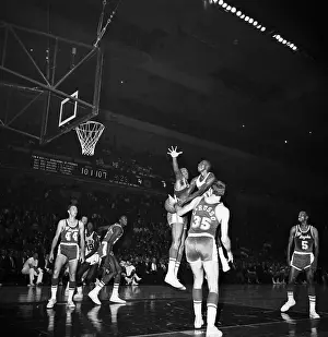 Elgin Baylor Blocking Johnny Green's Shot