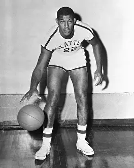 Elgin Baylor Dribbling Basketball