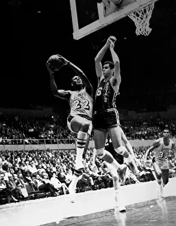 Elgin Baylor Driving Toward Basket