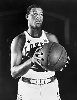 Elgin Baylor Holding Basketball