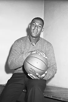 Elgin Baylor Poses with Basketball