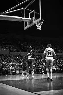 Elgin Player Fouling Opponent in Game