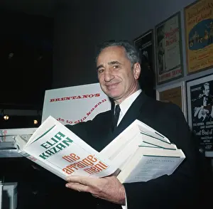 Elia Kazan Holding His New Book