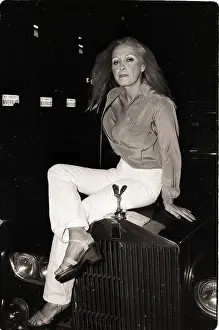 Elizabeth Ray Posing on Rolls Royce