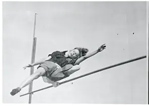 Elizabeth Stein Clearing the High Jump Bar
