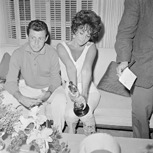 Elizabeth Taylor and Eddie Fisher with Reporter