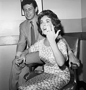 Elizabeth Taylor Modeling Her Wedding Ring