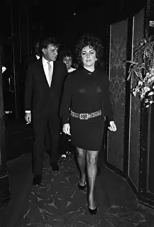 Elizabeth Taylor and Richard Burton Walking to Restaurant