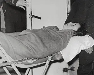 Elizabeth Taylor Wrapped in Blanket En Route to Hospital