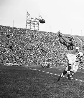 Tight End Prints: Elroy Hirsch up in the Air to Catch Football