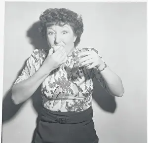 Sour Prints: Elsie Arno Eating Sour Lemon