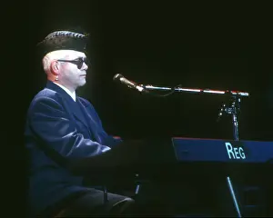 Prints of LOS ANGELES - CIRCA 1988: Pop singer Elton John performs onstage at the Hollywood Bowl in circa 1988 in Los Angeles, California. (Photo by Michael Ochs Archives/Getty Images) Rocket Man: From Stage to Spotlight: Elton At The Hollywood Bowl