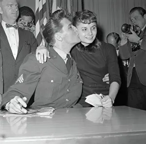 Fort Dix Prints: Elvis Kisses Woman at Press Conference