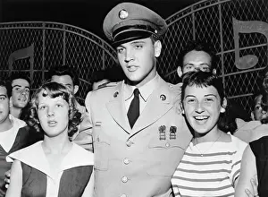Memphis Prints: Elvis Posing with Two Teenage Girls