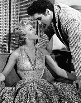 Elvis Presley and Ann Neylan in Movie Scene