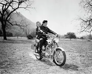 Elvis Presley And Barbara Stanwyck on Motorcycle