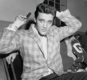 Elvis Presley Combing His Hair