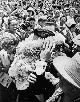 Elvis Presley in an orgy of lei's
