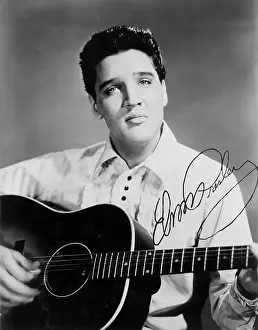 Elvis Presley portrait with acoustic guitar