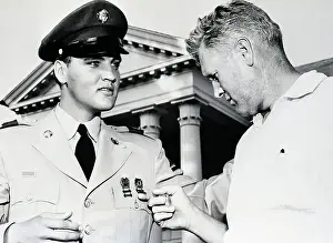 Elvis Presley's Father Admiring Medals