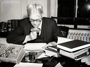 Emerson Christie Holds Magnifying Glass