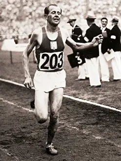 Finishing Prints: Emil Zapotek Winning 10, 000 Meter Race