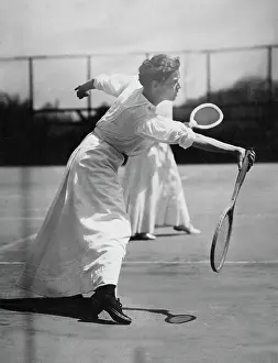 Prints of Tennis player Emily Woodall from Cincinnati, swings to make a shot, circa 1905. (Photo by Paul Thompson/European Picture Service/FPG/Archive Photos/Getty Images) The Grand Slam Gallery: Emily Woodall, Circa 1905