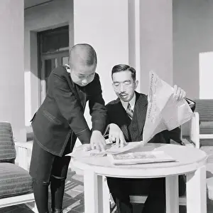 Hirohito Prints: Emperor Hirohito and Prince Akihito Reading a Newspaper