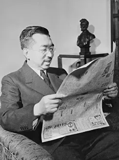 Hirohito Prints: Emperor Hirohito Reading Newspaper