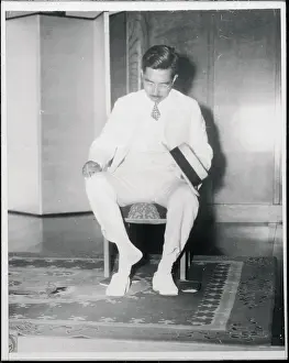 Hirohito Prints: Emperor Hirohito Removing His Shoes