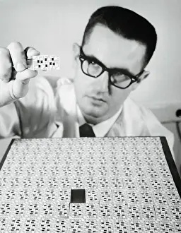 Engineer Inspecting Chip