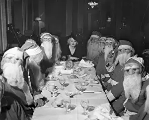 Entertainer Peggy Hopkins Joyce at Table with Santa Clauses