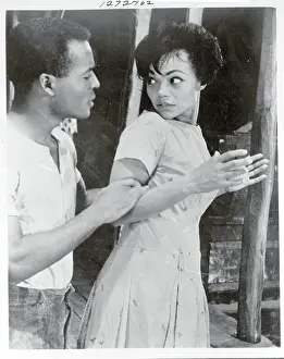 Prints of (Original Caption). Eartha Kitt is shown as she appears in the stage play, Mrs. Patterson Captivating Art Prints Celebrating the Iconic Performer’s Legacy: Entertainer and Singer Eartha Kitt Posing Seductively