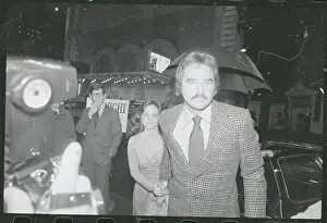Optimism Prints: Entertainers Burt Reynolds and Sally Field Strolling into Theater