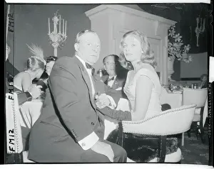 Entertainers George Jessel and Joan Tyler Holding Hands Club