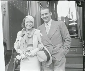 Prints of (Original Caption). Hollywood: Mack In Hollywood. Joan Crawford and Douglas Fairbanks, Jr. shown as they returned to Hollywood after a six weeks trip abroad A Glamorous Life Captured: Entertainers Joan Crawford and Douglas Fairbanks Jr. at Train