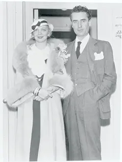 Entertainers John Gilbert and Wife Virginia Bruce Posing on Liner