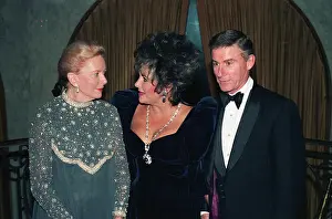 Prints of (Original Caption) A Visual Odyssey Through Glamour and Stardom: Entertainers Posing at Lifetime Achievement Awards Ceremonies