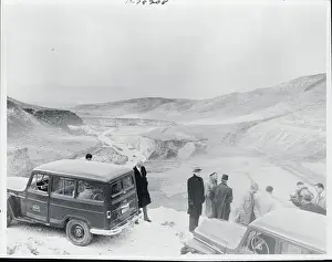 Eric Johnston and Colleagues Looking Down into Valley
