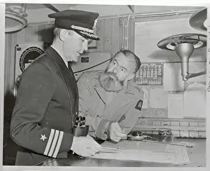 Ernest Hemingway Aboard Ship with Captain