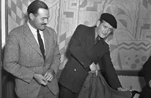 Ernest Hemingway Conversing with Sidney Sullivan