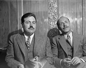 Ernest Hemingway Sitting with Donald Ogdon Stewart
